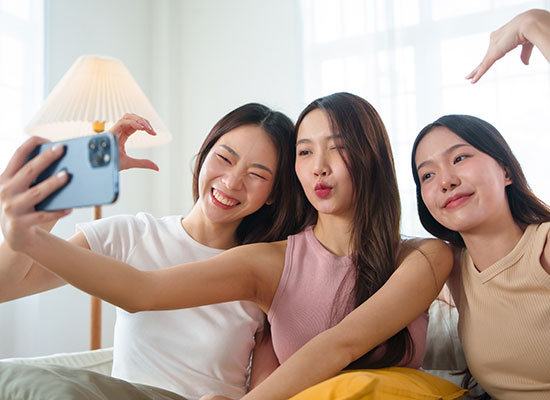 Three friends taking a selfie