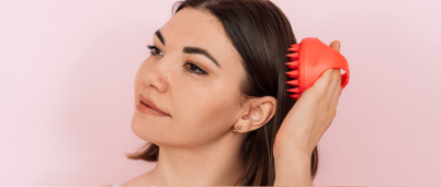 A woman brushing her hair