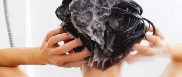 A woman washing her hair