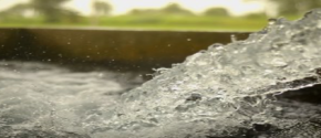 water pouring into a reservoir