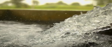 water pouring into a reservoir