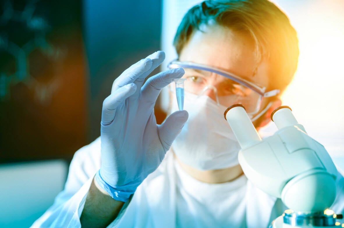 Lab technician inspects a CASE formulation